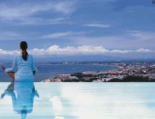 View from Infinity Pool's edge toward the bay and Puerto Vallarta