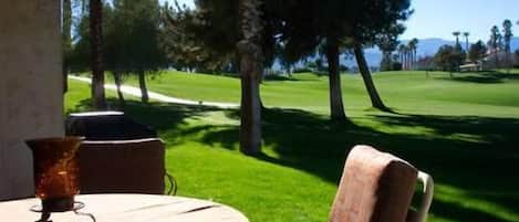 Outdoor dining with expansive lawn and great golf course views!