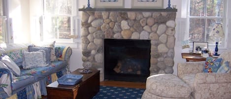 The Cottage Living Room with Beach Stone Fireplace