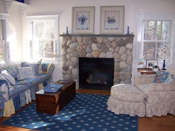 The Cottage Living Room with Beach Stone Fireplace