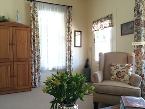 Sink into the easy chair with a good book or watch the neighborhood pass by.