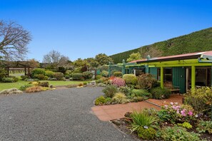 Beautiful gardens surround the home