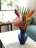 bouquet of protea on coffee table