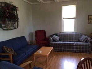 Living room with fireplace for added winter coziness.