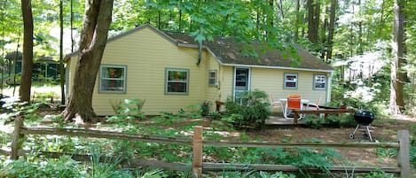 view of cottage looking from the driveway
