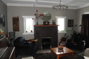 Formal lounge, gas fire, piano