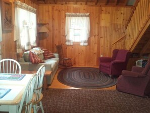 Dining and living area as you enter the cottage.