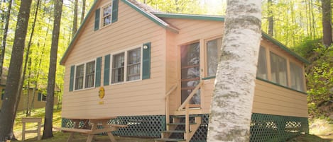 Side view of cottage with side porch.