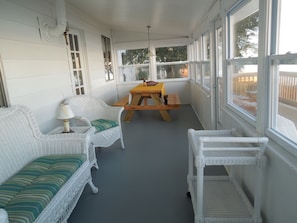 Enclosed porch (Air Conditioned/Heated) and Screen Windows