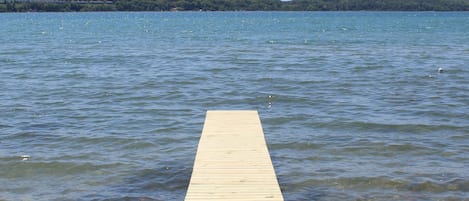 Private dock with over 50 feet of frontage with crystal clear water.