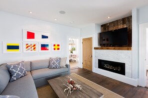 View of living room with gas fireplace