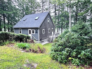 This is the back side of the cabin that faces the road