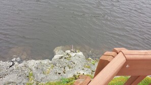 The home is right on the River, you can often see turtles sunning on the rocks!