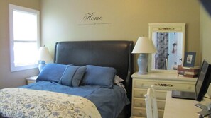 Queen size bed, closet, dresser/mirror, desk/chair
