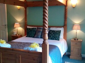 Master Bedroom, with a wonderful view through the arch window.
