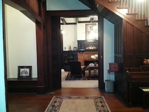 Entry way, with fabulous architectural details, leading to formal living room