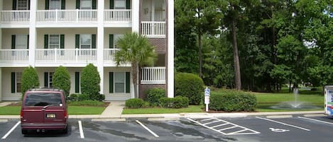 Front of Condo with Golf Course Behind Unit