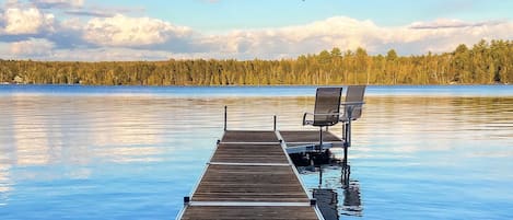 Dock views with 2 chairs & table attached to the dock itself