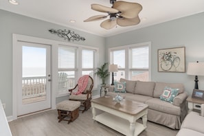 Living room located on top floor with wonderful ocean views.