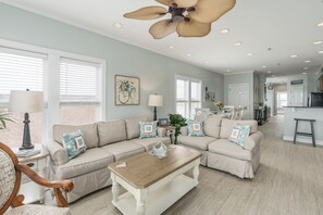 Living room with pull out queen sofa bed. 