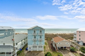 Beach access  is  just across street between the coral houses. 