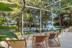 Deck chairs for sunbath overlooking the sea