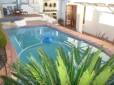 Solar heated pool and jacuzzi (both with safety net)