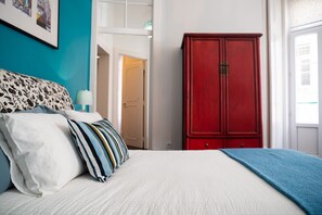 BLUE bedroom with double bed.