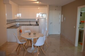 Spacious livingroom with new and modern kitchen