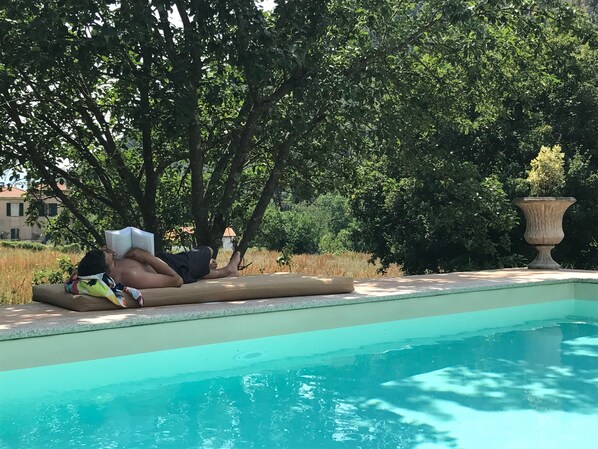 Relaxing by the pool. The pool is connected directly to the house. 