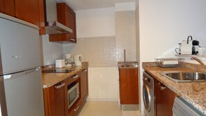 The fully equipped kitchen
