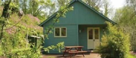 Garden to deck and double front doors.