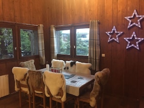 Dining area, ceiling is full height to top of chalet