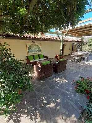 Shaded patio seating area
