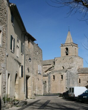 Street view of house with Baptistry in the background