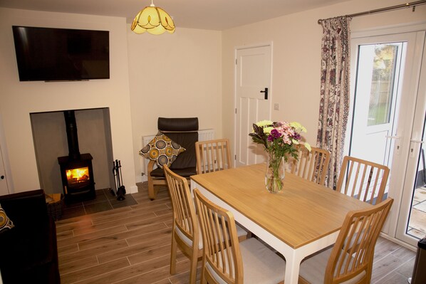 Family dining and sitting room, smart tv and Wood-burning stove, to relax by