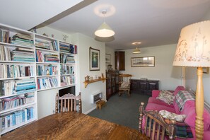 Lounge with a large collection of local books and maps