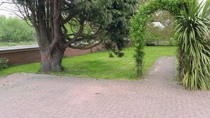 parking bay for the cottage   under the tree 