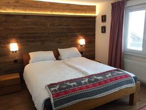 master bedroom with additional balcony