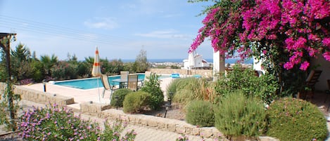 Kyrenia and sea view over mature garden and pool