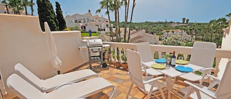 Nice Terrace with dinning place and sun loungers and Weber gas BBQ