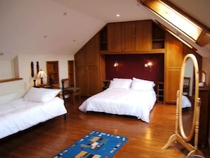 The Bedroom, 1 king bed and 1 single bed