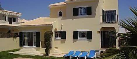 View of pool and house from rear garden