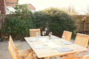 view  of the dining table on the terrace