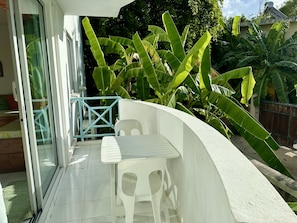 Balcony shown with table and 2 chairs (2 extra chairs available if needed).