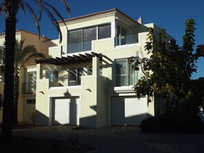 South facing villa with a nice L-shape terrace on the top floor.