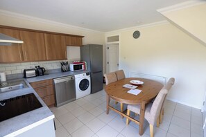 Kitchen / diner with views across the garden.