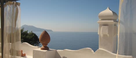 Large solarium overlooking Capri and the bay of Naples; outdoor furniture