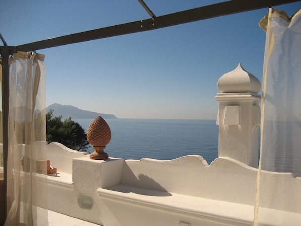 Large solarium overlooking Capri and the bay of Naples; outdoor furniture