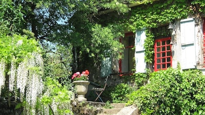 Stone farm cottage overlooking historic working village
